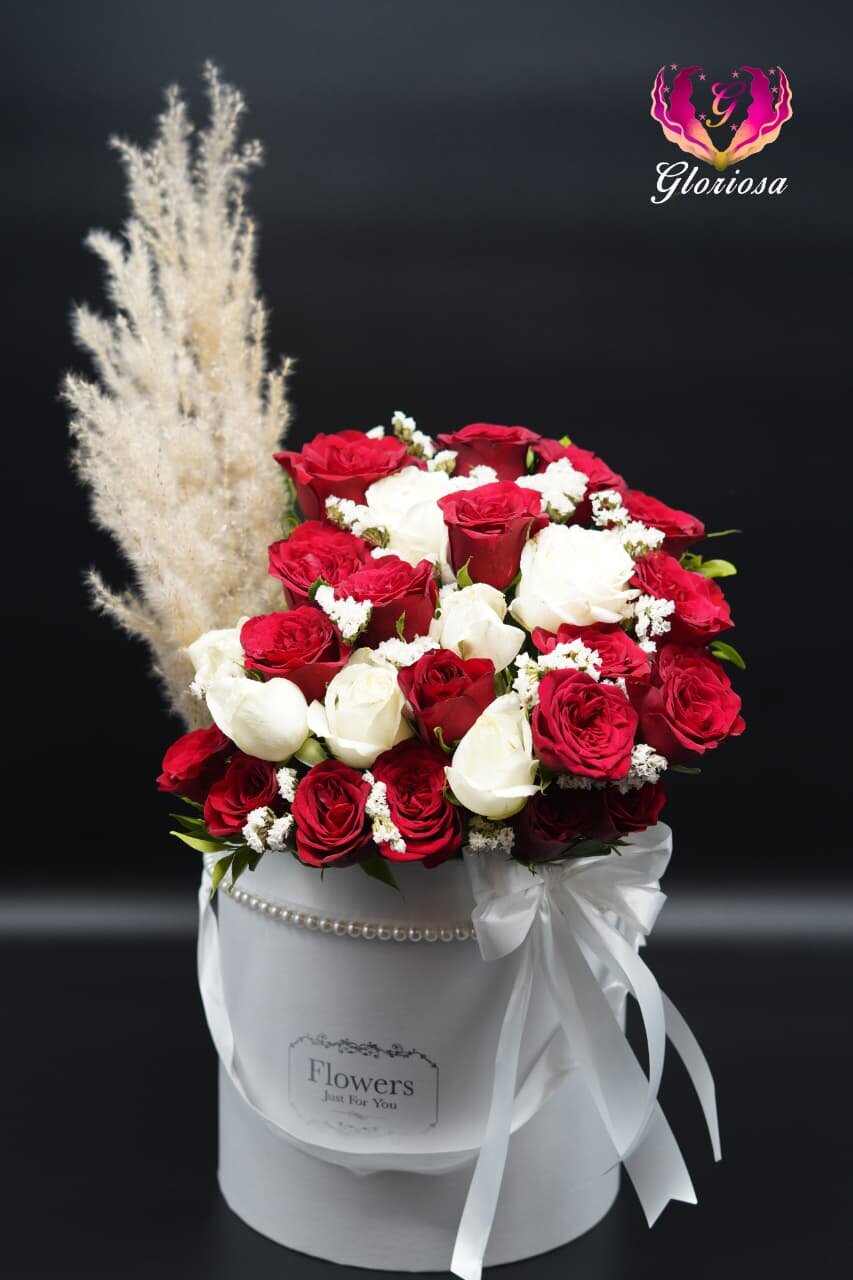 Red and white roses with pampas grass in pearl hat box